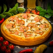 Пицца с ветчиной и грибами